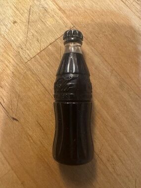 Vintage Coca-Cola Miniature Bottle Figurine in Black and Clear- l